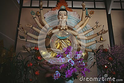 Statue of the Avalokitesvara Bodhisattv or Thousand-armed Buddha Stock Photo