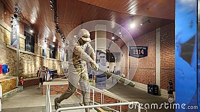 A statue of the baseball player Hank Aaron hitting a baseball inside of at Truist Park in Atlanta Georgia Editorial Stock Photo