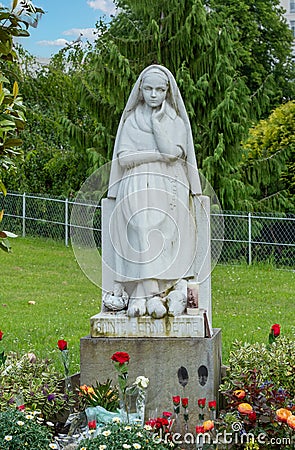 Statue of Bernadette of Lourdes Stock Photo