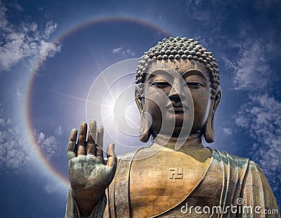 The statue of Big Buddha face with hand in Hongkong Stock Photo