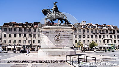 Statue in bronze of King Joao I of Portugal in Figueira Square. Editorial Stock Photo