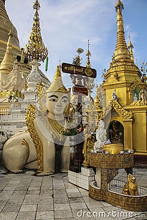 Statue of Buddha in Shwedagon Pagoda in Yangon, Myanmar Burma Editorial Stock Photo