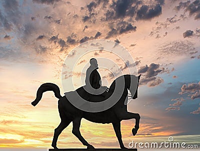 Statue of Carol I silhouette with dramatic sunset. Bucharest, Romania Editorial Stock Photo