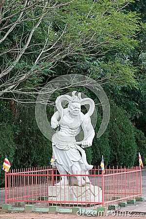 Statue of a Chinese warrior at the Buddhist temple Editorial Stock Photo