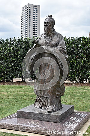 Statue of Confucius at McGovern Centennial Gardens at Hermann Park in Houston, Texas Editorial Stock Photo