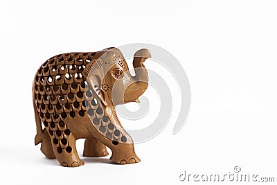 elephant statue carved in wood, on white background Stock Photo