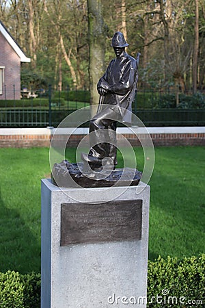 Statue on the field of honour in on the grebberberg where a lot of dutch soldiers fall in 1940 at the start of world war 2 in the Editorial Stock Photo