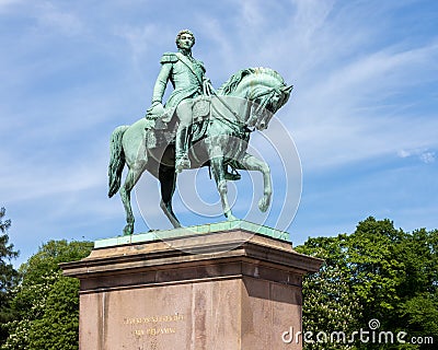 Statue of former Swedish and Norwegian King Karl XIV Johan sitting on a horse. Stock Photo