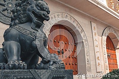 Statue in front of the Jing An Temple in Shanghai China Editorial Stock Photo