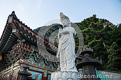 Statue in front of Sanbanggulsa temple and Sanbang mountain, Sanbang-ro, Jeju Island, South Korea Stock Photo