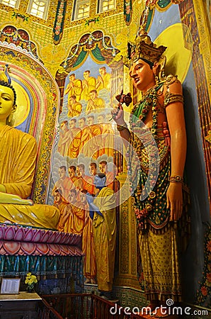 Statue in Gangaramaya Vihara Buddhist Temple , Colombo , Sri Lanka Stock Photo