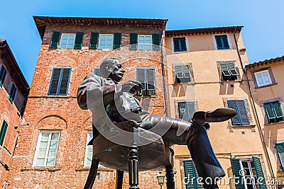 Statue of Giacomo Puccini in front of his birthplace in Lucca, Italy Editorial Stock Photo