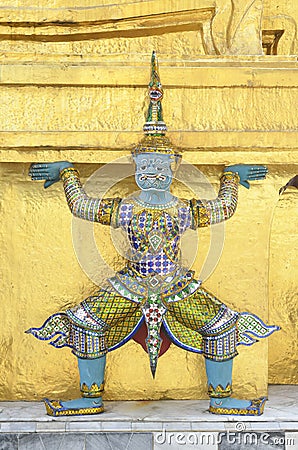 Statue giant with golden pagoda Stock Photo