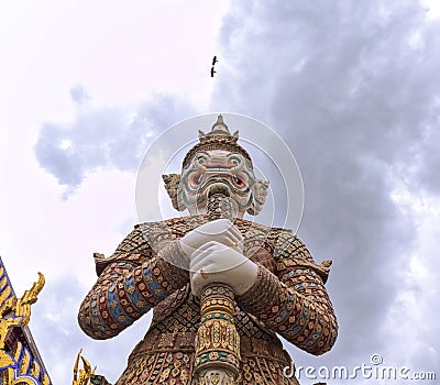 Statue of giant Yaksha demon guarding gates, Grand Palace, Bangkok, Thailand Stock Photo