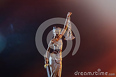 Statue goddess of justice on dark background Stock Photo