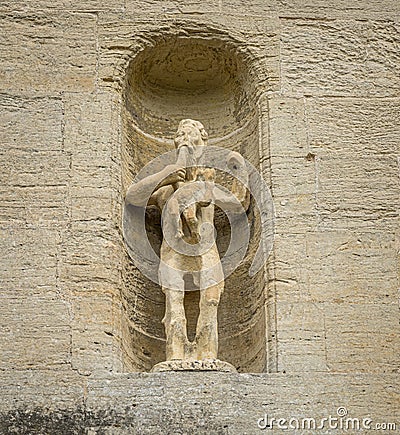 Statue of greek god Saturn at Fountains Hall in Yorkshire, England Editorial Stock Photo