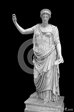Statue of the Greek goddess Hera or the Roman goddess Juno on black with clipping path. Goddess of women Stock Photo