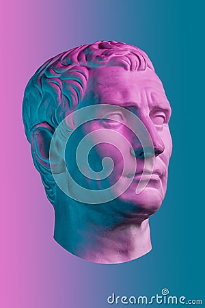 Statue of Guy Julius Caesar Octavian Augustus. Creative concept colorful neon image with ancient roman sculpture Guy Editorial Stock Photo