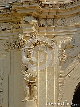 Statue of a half naked man, detail of the medieval city gate of Alba Iulia Editorial Stock Photo