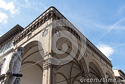 Statue Hercules and Cacus and fragment of the Loggia della Signoria, Florence, Italy Editorial Stock Photo