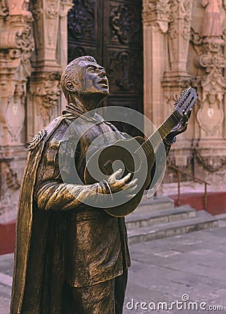 Statue in Homage to the Musicians of the Traditional Rondalla. Editorial Stock Photo