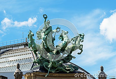 Statue Immortality outstripping Time on top of the Grand Palais in Paris Stock Photo