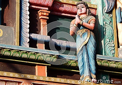 Statue of Indian Hindu woman gesture welcome people in the entrance of temple Editorial Stock Photo