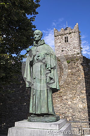 Luke Wadding Statue and the French Church in Waterford Stock Photo