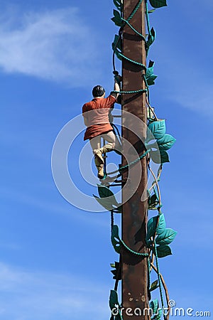 Statue of Jack and his bean stalk with blue sky background. Stock Photo