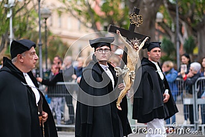 A religious icon statue of Jesus carried in the Saint Efisio Feast festival parade. Editorial Stock Photo