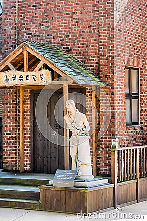Statue of Jesus Christ in front of prayer house Editorial Stock Photo