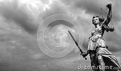 Statue of justice goddess Justitia with cloudy sky, Black and Stock Photo