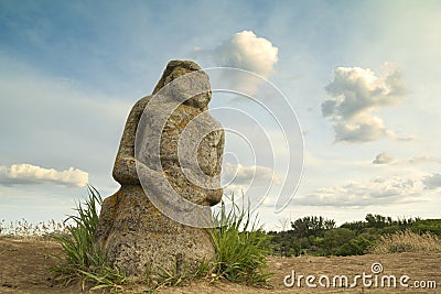 Statue on kurgan Stock Photo