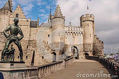 Statue of Lange Wapper in front of the castle in Antwerpen. Lange Wapper is a legend about a giant who irritates people, children Editorial Stock Photo