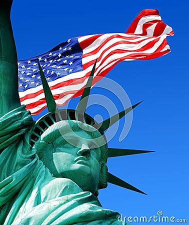 Statue of liberty with the american flag Stock Photo