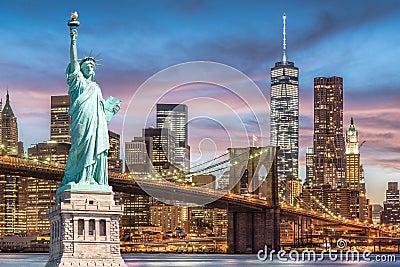 The Statue of Liberty and Brooklyn Bridge with World Trade Center background twilight sunset view, Landmarks of New York City Stock Photo