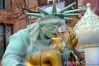 Statue of Liberty kissing Lady Justice. Fallas 2016 Valencia. Blue statue kiss golden statue. Women kissing. Valentines day. Stock Photo