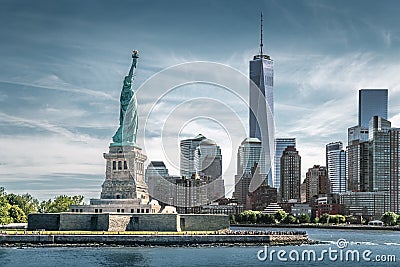 The Statue of Liberty with One World Trade Center background, Landmarks of New York City Editorial Stock Photo