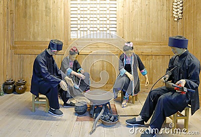 Statue of life scene of Zhuang family in Anthropology Museum Of Guangxi, adobe rgb Editorial Stock Photo