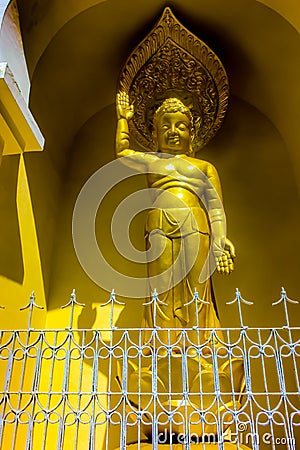 Statue of Lord Buddha in standing posture at Japanese Peace Pagoda, Darjeeling, India Stock Photo