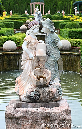 Statue of lovely boy and girl in the public garden Stock Photo