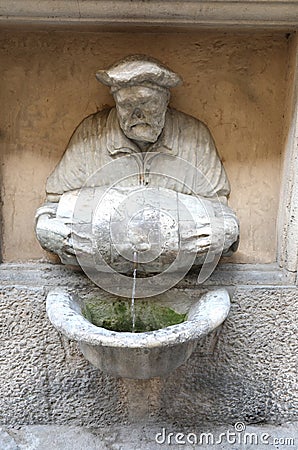 statue of man with barrel is a legendary Porter in the fountain Stock Photo