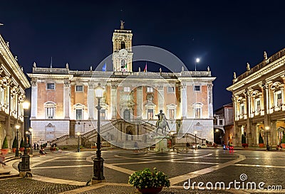 Statue of Marcus Aurelius and Conservators Palace Palazzo dei Conservatori on Capitoline Hill at night, Rome, Italy Stock Photo