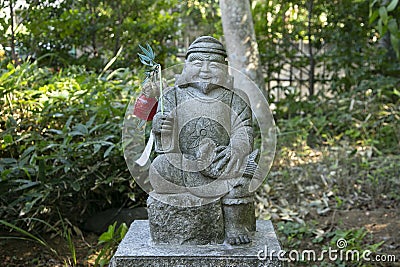 Statue of a monk at a Shinto shrine in the city of Sakura in Japan. Stock Photo