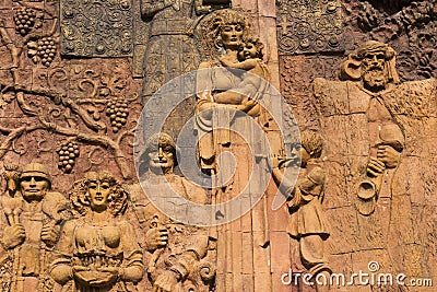 Statue and monument on the wall in Kutaisi, Imereti, Georgia Editorial Stock Photo