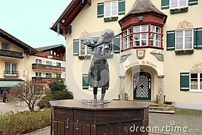 Statue of Mozart in village Sankt-Gilgen, Austria. Editorial Stock Photo