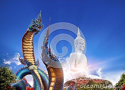 Statue of Naka Buddha and large Buddha statue at Mukdahan Province,Big Buddha Wat Phu Manorom Mukdahan Thailand. Stock Photo