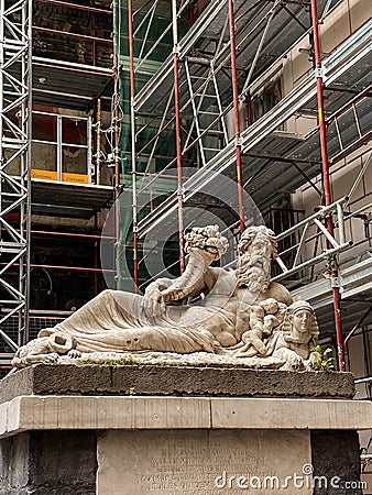 The Statue of the Nile God, an Ancient Roman marble statue located at Piazzetta Nilo, Naples, Italy Editorial Stock Photo