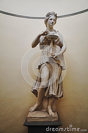 Statue at Officina Profumo Farmaceutica di Santa Maria Novella, Florence, Italy Editorial Stock Photo
