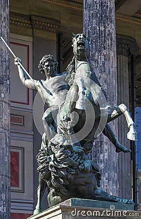 Statue before an old museum, Berlin Stock Photo